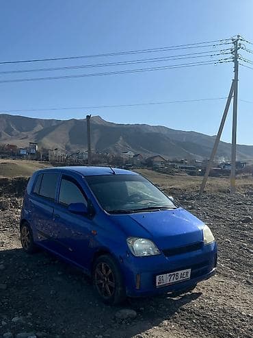 golf 2: Daihatsu Cuore: 2003 г., Автомат, Бензин, Хэтчбэк — 8