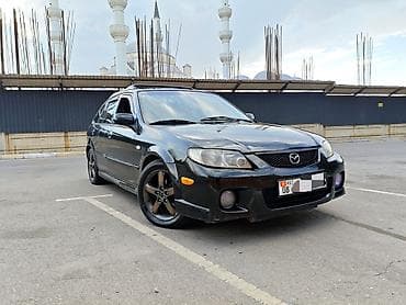 Mazda 323: 2002 г., 1.6 л, Автомат, Бензин, Хэтчбэк