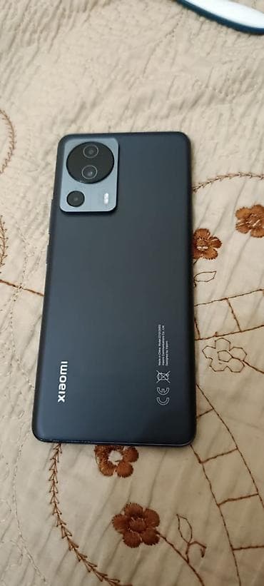 nokia 5230: Xiaomi, 13 Lite, 256 ГБ, цвет - Черный — 1