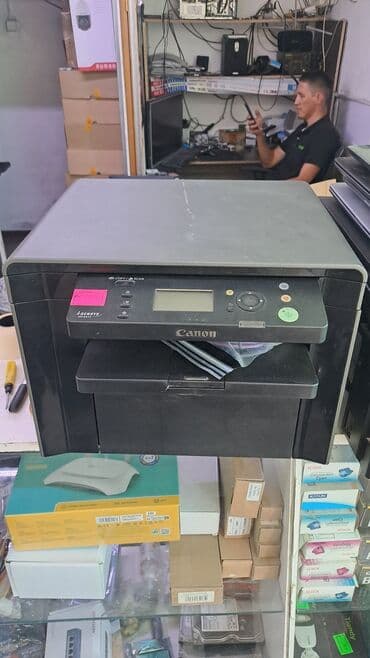 широкоформатный принтер: Многофункциональное лазерное устройство Canon i-SENSYS MF4410 в черном — 1