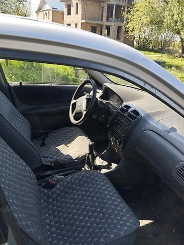 Продажа авто: Mazda 323: 1999 г., 1.6 л, Механика, Бензин, Седан — 4