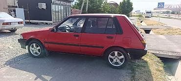 red cell: Toyota Corolla: 1995 г., Механика, Бензин, Хэтчбэк — 7