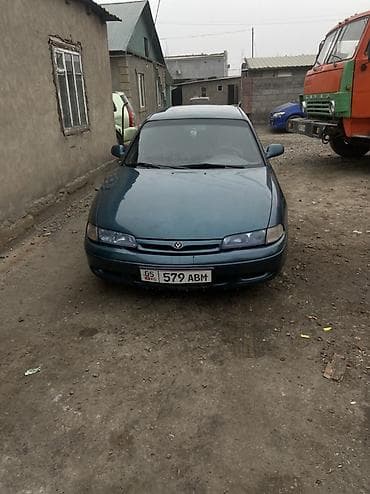кулиса на 210: Mazda 626: 1992 г., 2 л, Механика, Бензин, Хэтчбэк — 2