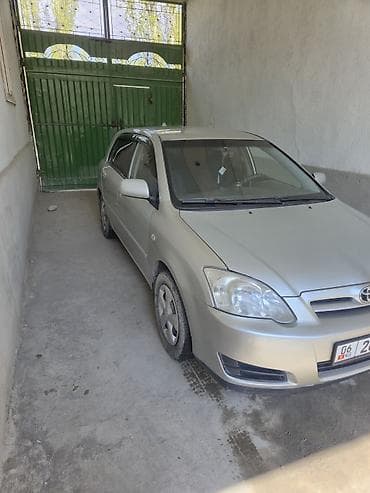 Toyota Corolla: 2005 г., 1.6 л, Кол менен иштөөчү, Бензин, Хетчбек — 7