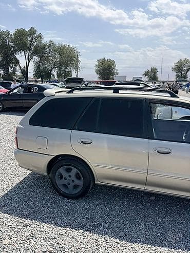 хунчи авто: Mitsubishi Lancer: 1995 г., Универсал — 3