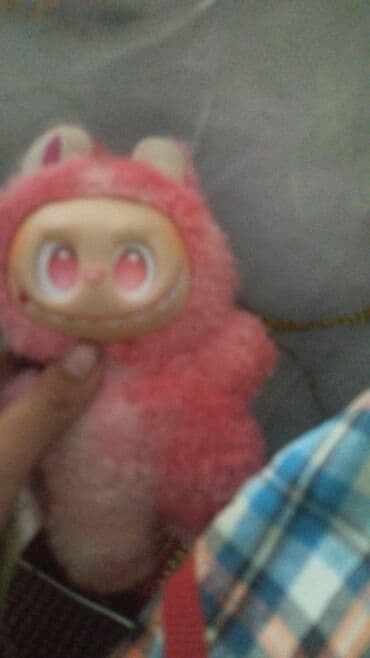 одежды для новорожденных: Плюшевая игрушка розового цвета, выполненная в виде сказочного — 1