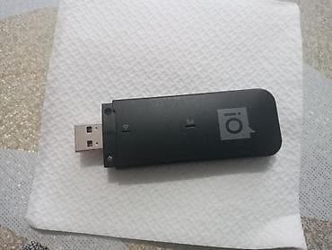 USB 3G/4G модем (с поддержкой SIM) с разъёмом USB-A. Описание: -