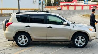 обмен на частный дом: Полноприводный кроссовер Toyota RAV4 бежевого цвета с 5 дверями — 4