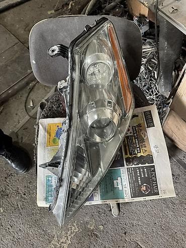 led h11: Передняя левая фара Nissan 2005 г. — 1