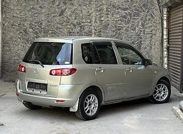 Mazda Demio: 2004 г., 1.3 л, Автомат, Бензин, Хэтчбэк