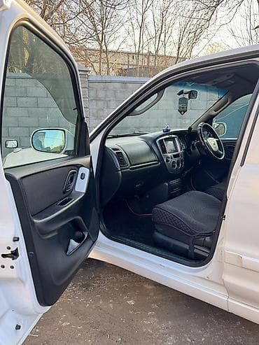 2 9тд: Mazda Tribute: 2003 г., 2 л, Автомат, Бензин, Кроссовер — 10