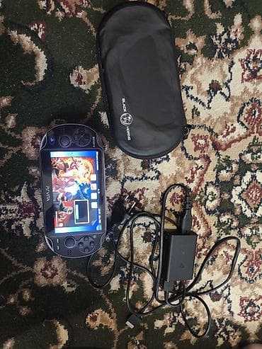 psp 3003: PS Vita (Sony) — портативная игровая консоль с 5" дисплеем и двумя — 5