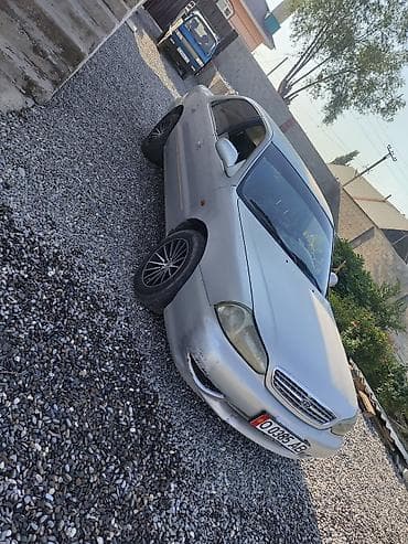 b v d: Kia : 1999 г., Механика, Бензин, Седан — 1