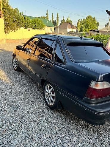 Унаа: Daewoo Nexia: 2006 г., 1.5 л, Кол менен иштөөчү, Бензин, Седан — 2