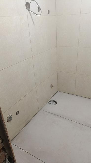 резка плитки: Плиточные работы под ключ: ванная/санузел/душевая - Профессиональная — 2