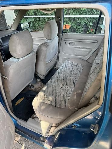 машина капейка: Mazda Demio: 1999 г., 1.5 л, Механика, Бензин — 6