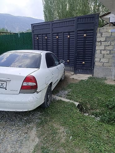 чанган уни к: Daewoo Nubira: 2001 г., 1.6 л, Кол менен иштөөчү, Бензин, Седан — 2