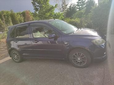 Mazda Demio: 2003 г., 1.3 л, Автомат, Газ, Хетчбек — 4