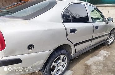 padjero mini: Mitsubishi Carisma: 2001 г. — 1