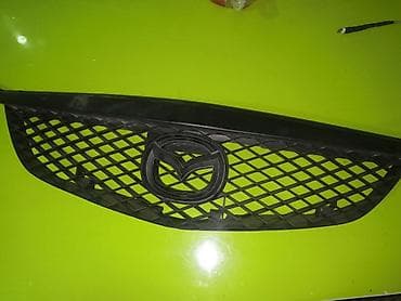 е38 бмв: Решетка радиатора Mazda Б/у, Оригинал — 1