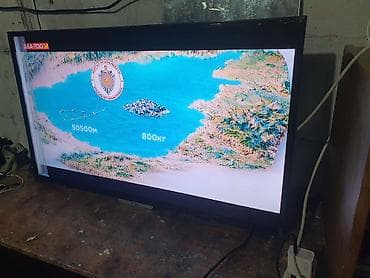 tab s: Телевизор VISION (диагональ примерно 32–40") с LED‑подсветкой. - — 3