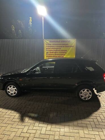 полик нексия 2: Mazda 323: 2001 г., 1.6 л, Механика, Бензиновая, Седан — 6