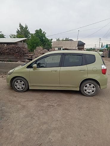 митсубиси спейс стар: Honda Fit: 2006 г., 1.3 л, Автомат, Хэтчбэк — 4