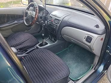 айни 95: Nissan Almera: 2000 г., 1.8 л, Механика, Бензин, Хэтчбэк — 4