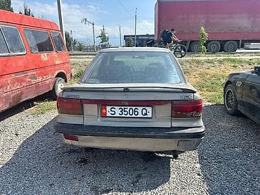 Mitsubishi Lancer: 1992 г., 2 л, Механика, Бензин, Седан — 4