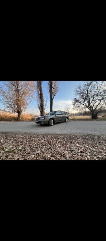 шкода практик: Nissan Primera: 2000 г., 2 л, Механика, Бензин, Универсал — 6