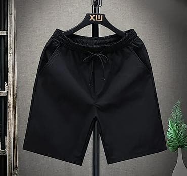 шорты мужской: Мужские однотонные шорты до колена - Модели: темно‑синие, зеленые — 4