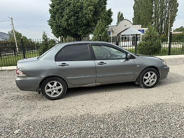 аудио усилитель: Mitsubishi Lancer: 2006 г., 1.6 л, Механика, Бензин, Седан — 8