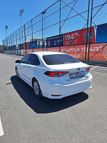 рестайлинг: Toyota Corolla: 2023 г., 1.8 л, Вариатор, Гибрид, Седан — 5
