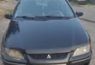 Mitsubishi Space Star: 2004 г., Хэтчбэк — 2