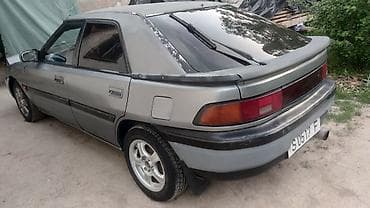 авто талас: Mazda 323: 1989 г., 1.6 л, Кол менен иштөөчү, Бензин, Хетчбек — 4