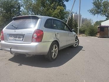 рейка на 210: Mazda 323: 2003 г., 1.5 л, Механика, Универсал — 3