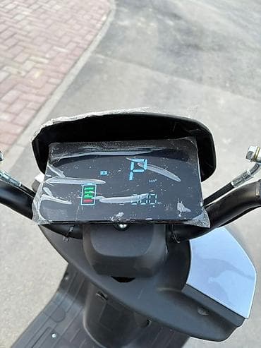 Кумурска мотороллер: Электроскутер RID — стиль и практичность на каждый день 🔹 Запас хода — 2