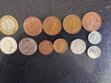 гераскутер новый: Подборка иностранных монет Состав набора (по фото): - Великобритания — 2