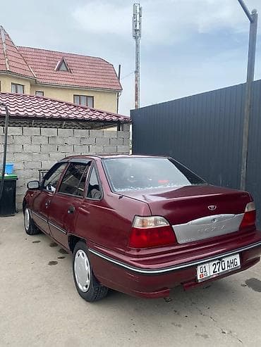 кен булун: Daewoo Nexia: 2004 г., Седан — 2