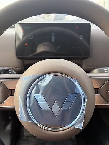 капитан: Wuling Starlight 730 EV。7‑местный семейный MPV. Кузов и дизайн: - — 7