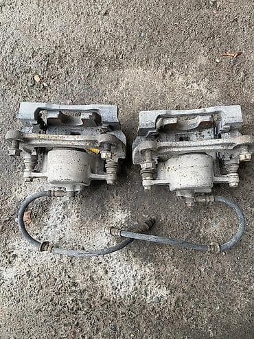 Задний левый суппорт Lexus Оригинал