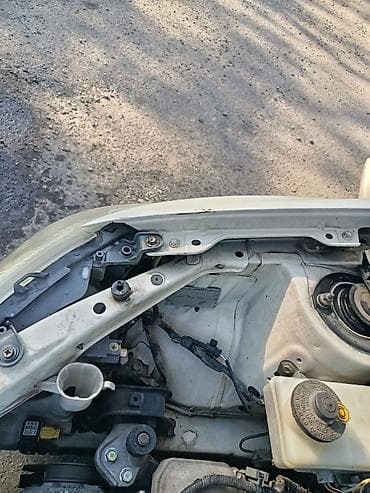 низкопрофиль: Toyota Ist: 2003 г., 1.3 л, Автомат, Бензин, Хэтчбэк — 10
