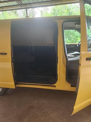 ом 605: Volkswagen Transporter T5 фургон (желтый) - Кузов — 5