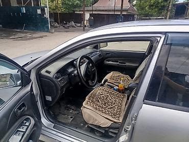 шины колеса: Mitsubishi Lancer: 2003 г., 1.6 л, Механика, Бензин, Универсал — 6