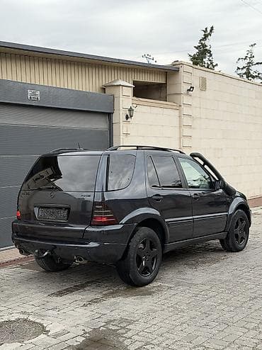 4х4 машина: Mercedes-Benz ML-Class AMG: 2001 г., 5.5 л, Автомат, Бензин, Седан — 4