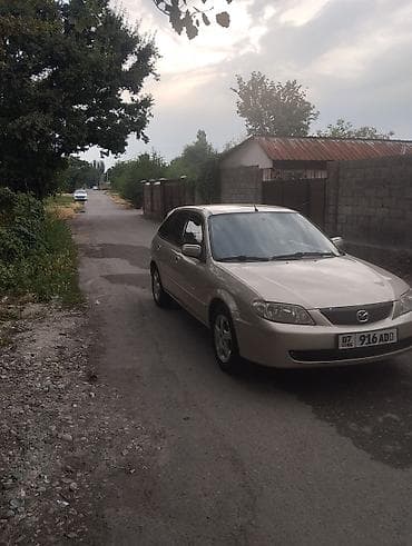 e2 byd: Mazda 323: 2002 г., 1.6 л, Механика, Бензин, Хэтчбэк — 6