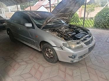 нетто машина: Mazda 323: 2002 г., 1.6 л, Механика, Бензин, Седан — 8