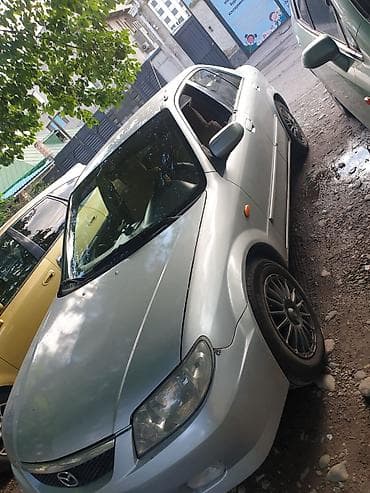 Mazda 323: 2002 г., Автомат — 2