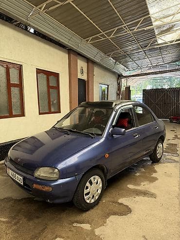 Mazda 121: 1994 г., 1.3 л, Механика, Бензин, Седан