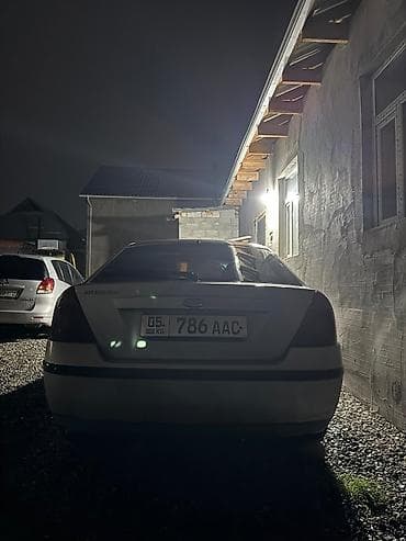 дордой мото: Ford Mondeo: 2002 г., 2 л, Кол менен иштөөчү, Бензин, Хетчбек — 3